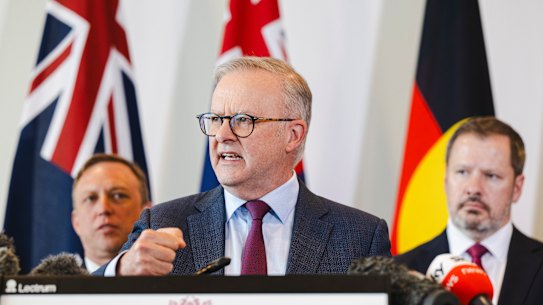 Prime Minister Anthony Albanese, flanked by Queensland Premier Steven Miles (left) and Science Minister Ed Husic announcing the deal in April.