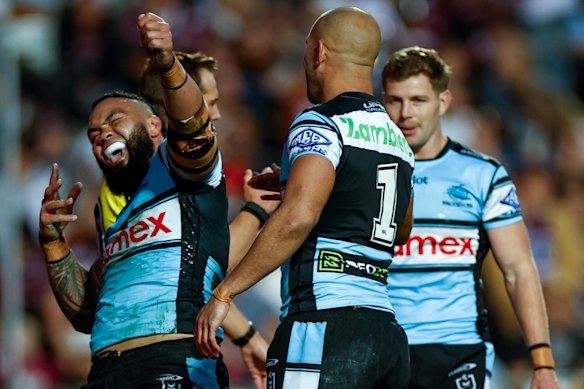 Cronulla players celebrate after Siosifa Talakai’s try.