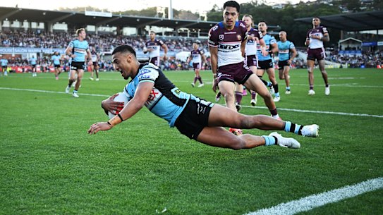 Ronaldo Mulitalo scores for the Sharks on Monday.