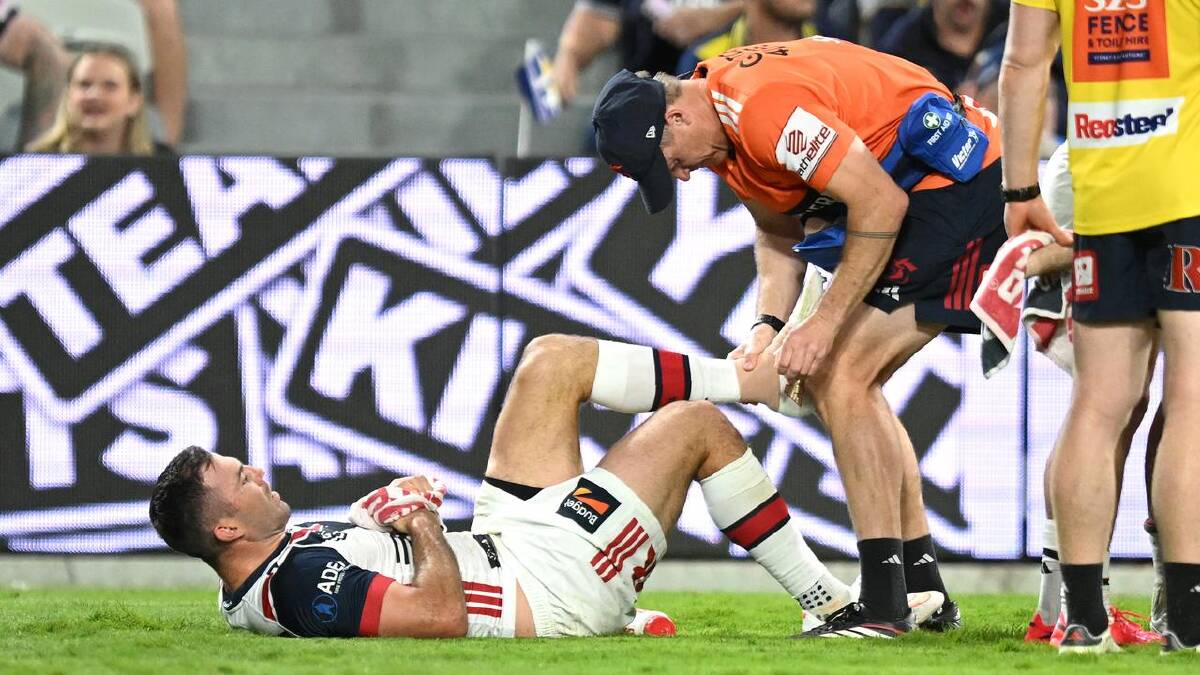 James Tedesco scored two first-half tries for the Roosters but went off with an ankle injury.  (PR IMAGE PHOTO)