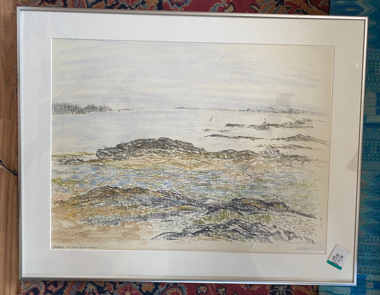 Framed harbour landscape in pastels framed in a silver frame. A price tag in its lower right corner says it's $4.99.