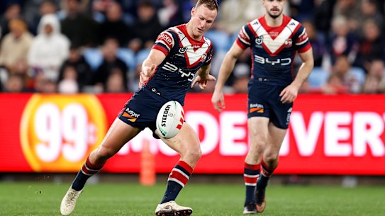 Daly Cherry-Evans kicks the ball.