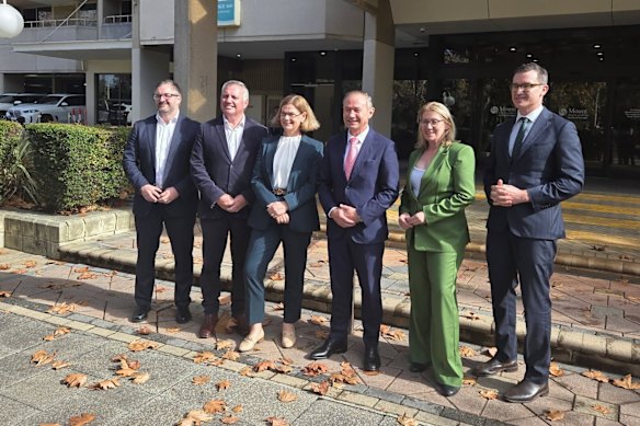WA Premier Roger Cook, Treasurer Rita Saffioti, Health Infrastructure Minister John Carey and Health Minister Meredith Hammat with Bethesda Health Care Executive Director Neale Fong and Mount Hospital general manager Patrick Turner when the takeover deal was announced in May.