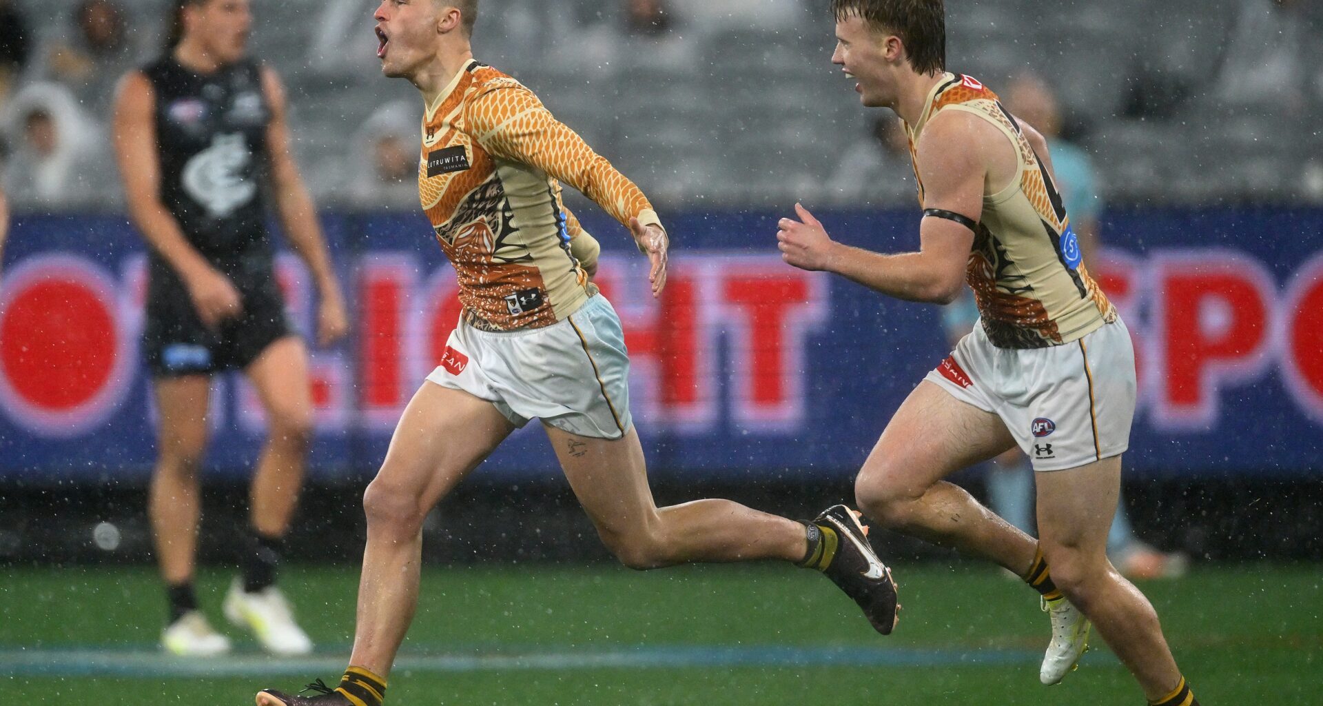 Hawks snap Blues' streak in wet and wild clash
