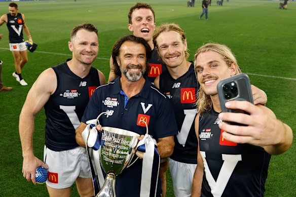 Victorian coach Chris Scott with his Geelong/Victorian players (from left) Patrick Dangerfield, Max Holmes, Tom Stewart and Bailey Smith.