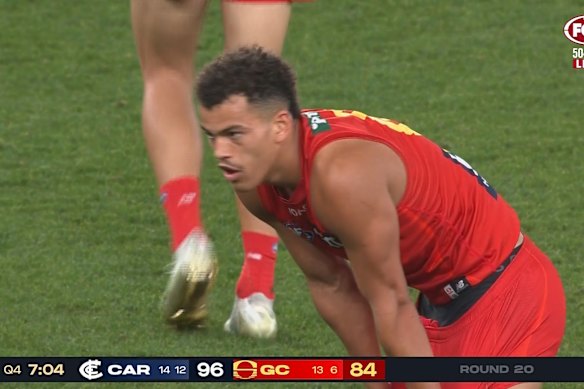 Leo Lombard looks on after a spray from Christian Petracca.