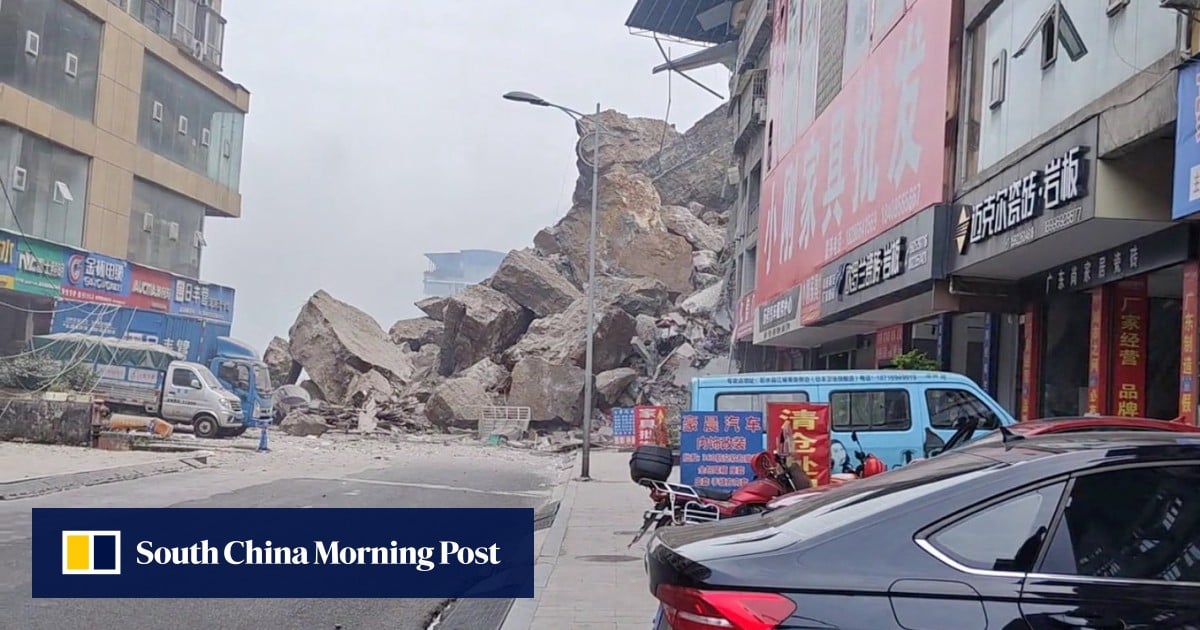 Rescuers in China race to reach residents trapped by landslide that has killed 8 people