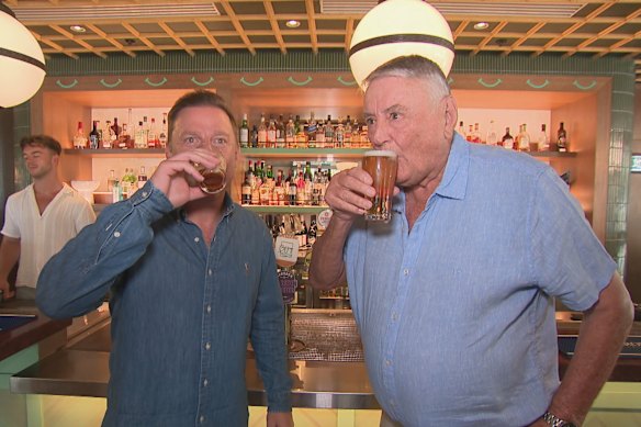 Arthur Laundy shares a beer with Ben Fordham after it was announced that Nine Entertainment sold its radio networks, including 2GB and 3AW.