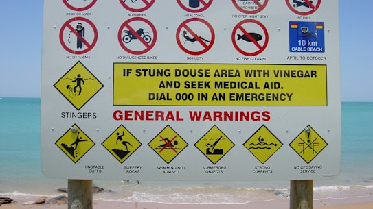 The number of warnings are overwhelming on a sign at Cable Beach, near Broome.