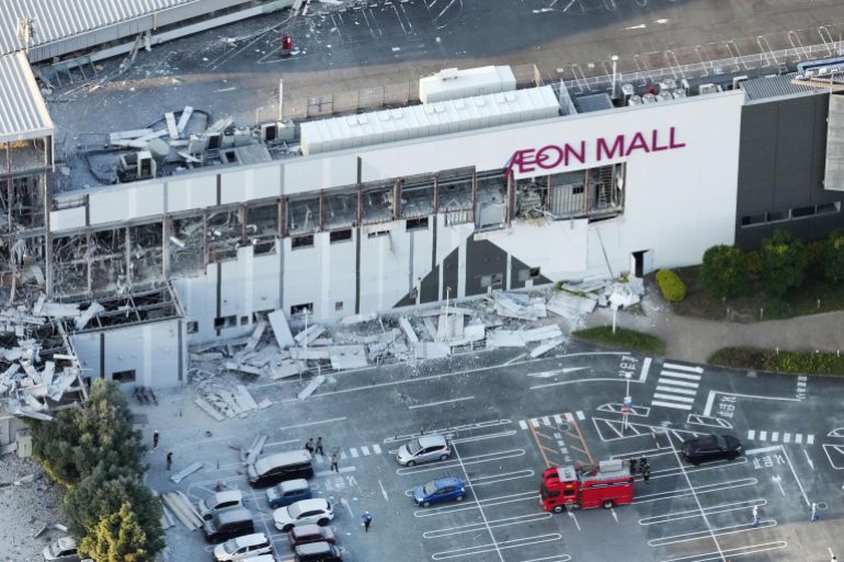 An aerial view shows the damaged Aeon Mall shopping centre