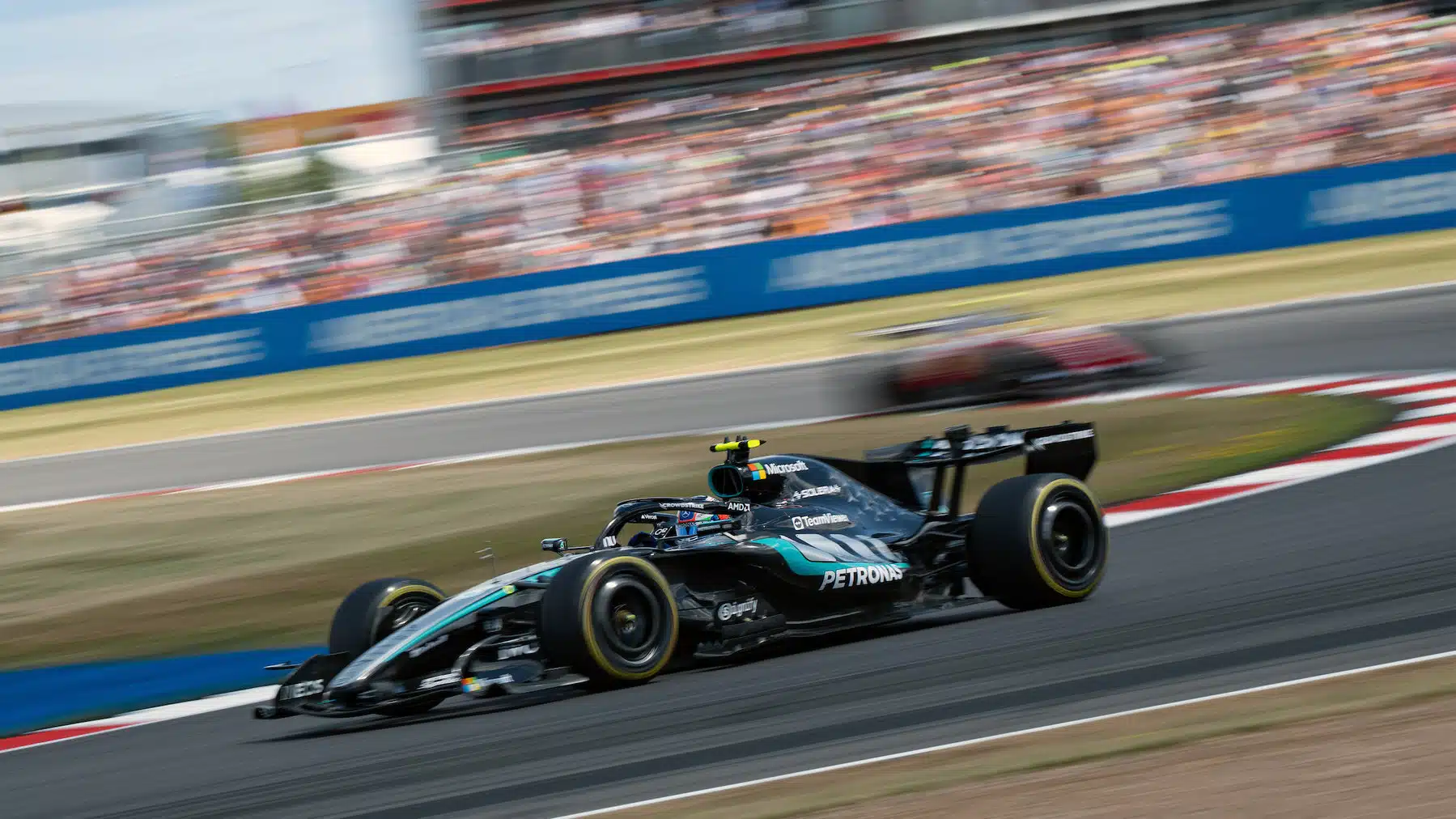 Kimi Antonelli (Mercedes) leads Lewis Hamilton (Ferrari) during the sprint before the 2026 British Grand Prix