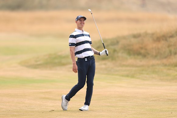 Cameron John of Australia plays a shot on the first hole on day three of the British Open. 