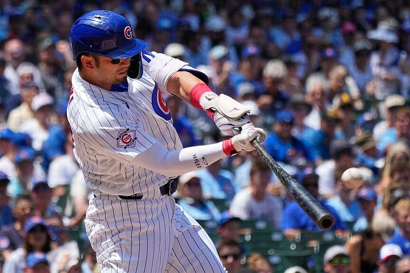 Chicago Cubs' Seiya Suzuki of Japan, hits a three-run home run during the first inning of a baseball game against the San Diego Padres in Chicago, Wednesday, July 1, 2026. (AP Photo/Nam Y. Huh)