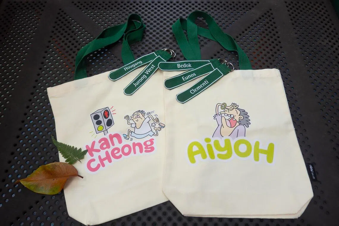 The merchandise includes bag charms and tote bags (pictured).