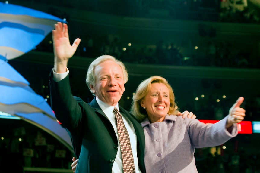 Vice Presidential candidate Joe Lieberman and wife Hadassah wave to the crowd