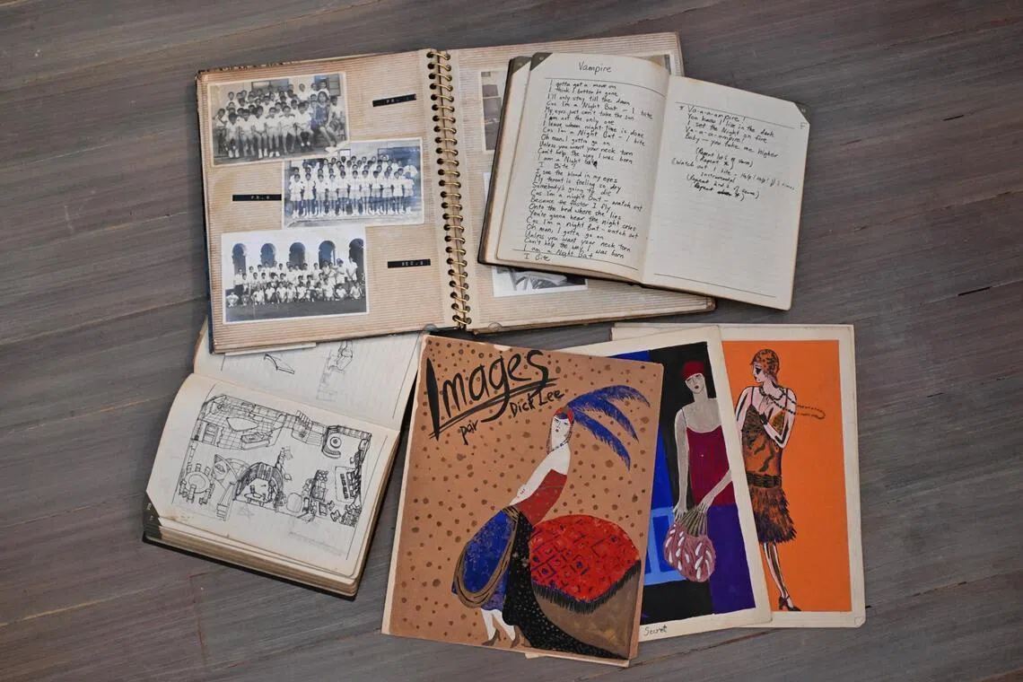 Some of Dick Lee’s journals, photo albums and drawings seen in the study room at his house on June 25, 2026.