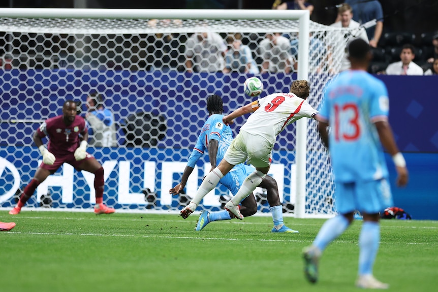 Harry Kane shoots at goal