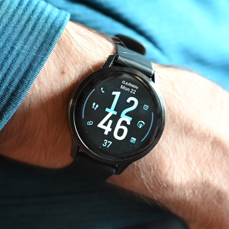 A close-up of the Garmin Venu 4 on the wrist of the writer.