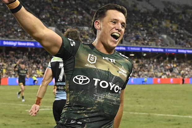 TOWNSVILLE, AUSTRALIA - APRIL 24: Scott Drinkwater of the Cowboys celebrates the try of Murray Taulagi of the Cowboysduring the round eight NRL match between North Queensland Cowboys and Cronulla Sharks at Qld Country Bank Stadium, on April 24, 2026, in Townsville, Australia. (Photo by Ian Hitchcock/Getty Images)