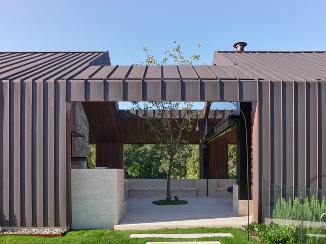 The property boasts six bedrooms and six bathrooms, as well as a stables and a full-size tennis court.