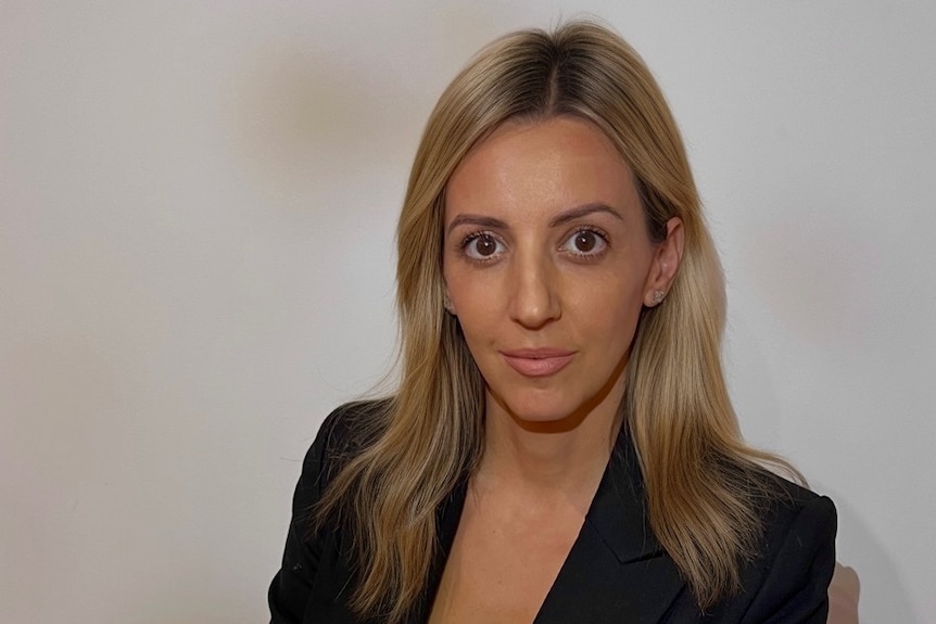 A professional posed photo of a player agent