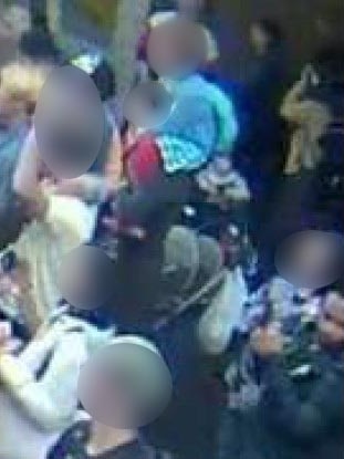 A CCTV image showing David James taking a picture of a minor which he later uploaded to the internet.