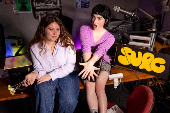 Calista Burrowes (left) and Lucy Horton in SURG FM’s station, inside the University of Sydney.