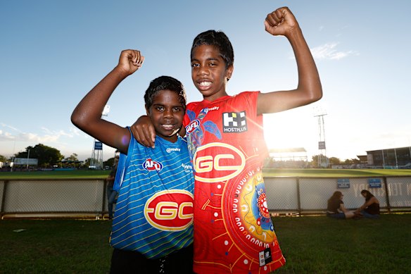 Young fans pose for the camera ahead of the Suns’ clash with the Saints in Darwin back in May.