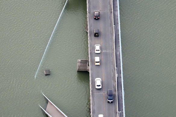 An  aerial image shows part of a bridge that collapsed after the earthquake in Yatsushiro, Kumamoto prefecture, southern Japan.