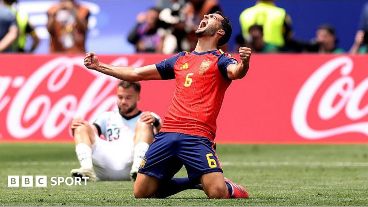 Mikel Merino celebrates his winning goal for Spain