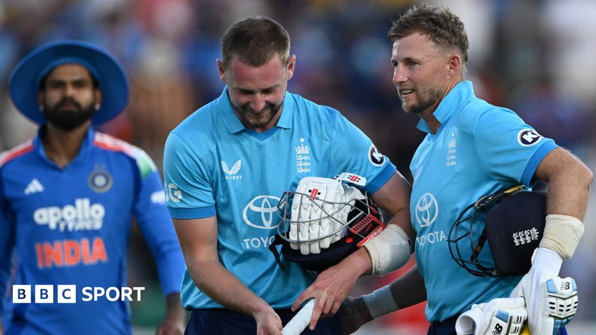 Joe Root, right, roars in the direction of Gus Atkinson as England seal victory over India