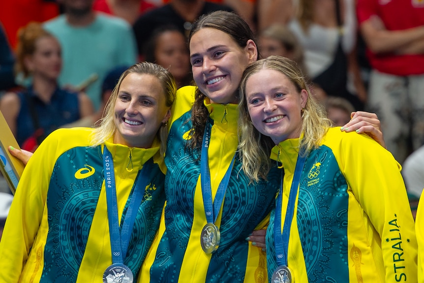 Bronte Halligan, Sienna Green and Abby Andrews hug