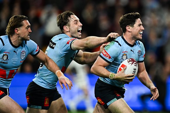 Mitchell Moses and the Blues celebrate that series-clinching try at Suncorp in 2024.