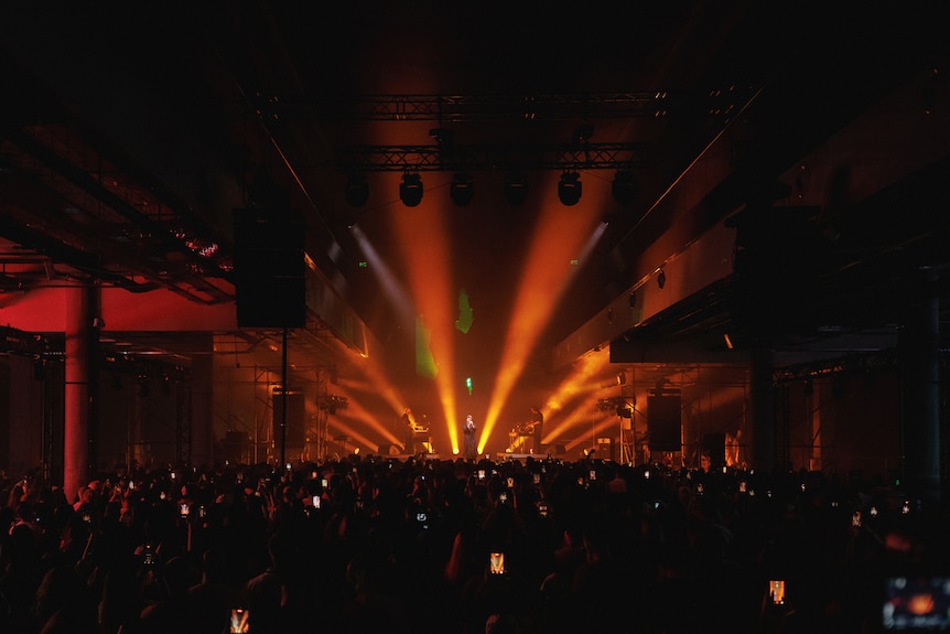 A band performs on a stage.