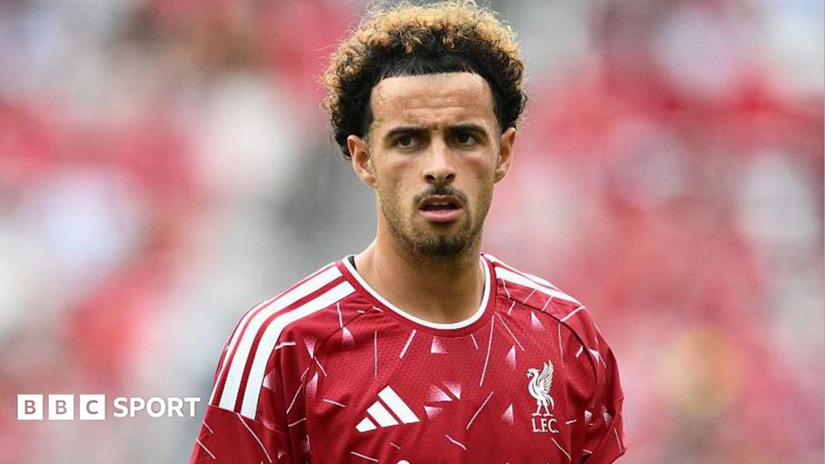 Curtis Jones in a Liverpool shirt