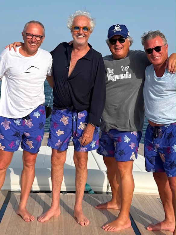 The significance of the matching board shorts is unknown for (from left) Stefano Domenicali, Flavio Briatore,  Paolo Campinoti and Andrew Fox enjoying the European summer. 