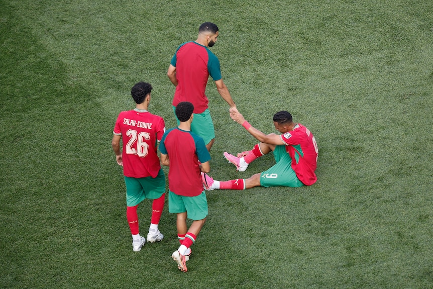 Moroccan players look disappointed after losing a game