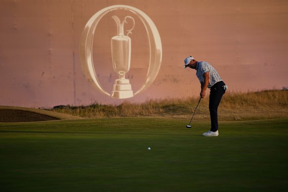 Lucas Herbert putts on the 18th green during the third day of the British Open.