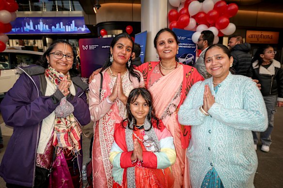 Members of the Indian community including Gayatri Gangapurkar (left), Rachita Savant (second from right) and Vedashree Jogalekar (right) at the Melbourne community summit for Indian Prime Minister Narendra Modi.