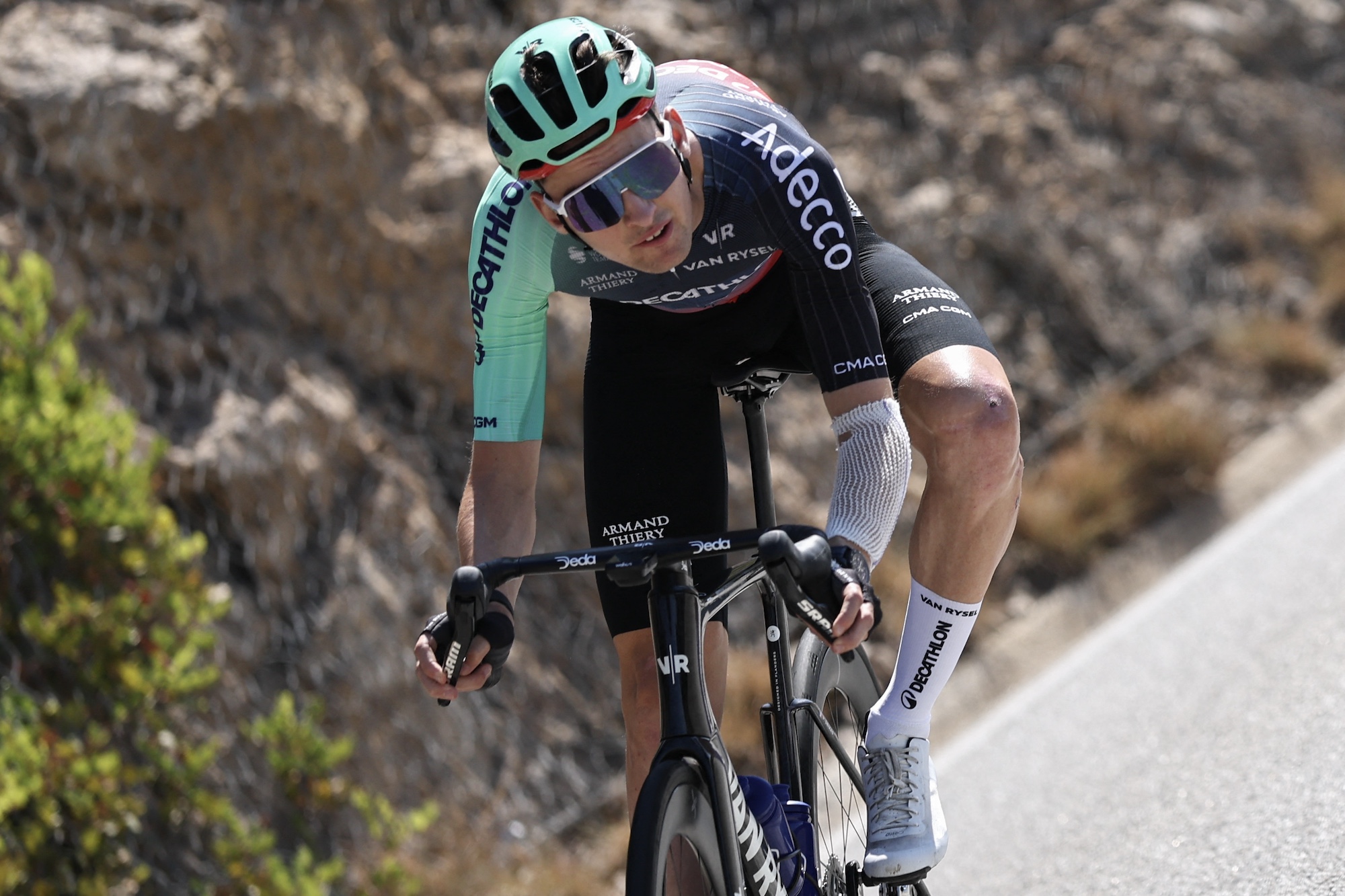 Paul Seixas (Decathlon CMA CGM) descending during a team training session before the Tour de France, still showing the signs of the earlier crash (Photo by Anne-Christine POUJOULAT / AFP)