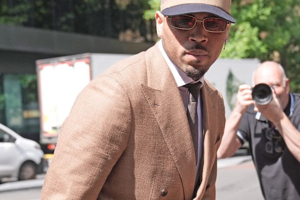 Chris Brown arrives at Southwark Crown Court, where he is charged over an alleged assault in a London nightclub, in London, Friday, July 24, 2026 