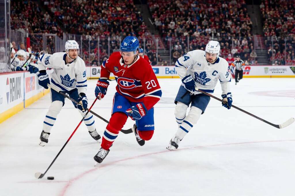 Juraj Slafkovsky of the Montreal Canadiens skates with the puck against opponent Auston Matthews and Oliver Ekman-Larsson of the Toronto Maple Leafs during the third period of the NHL regular season game between the Montreal Canadiens and the Toronto Maple Leafs at the Bell Centre on March 10, 2026 in Montreal, Quebec, Canada. (Arianne Bergeron / NHLI via Getty Images / The Athletic)