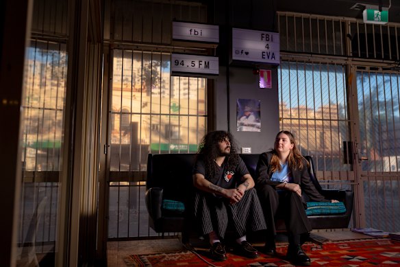 Tommy Boutros (left) and Jasmine Telfer inside FBi Radio’s station in Redfern.