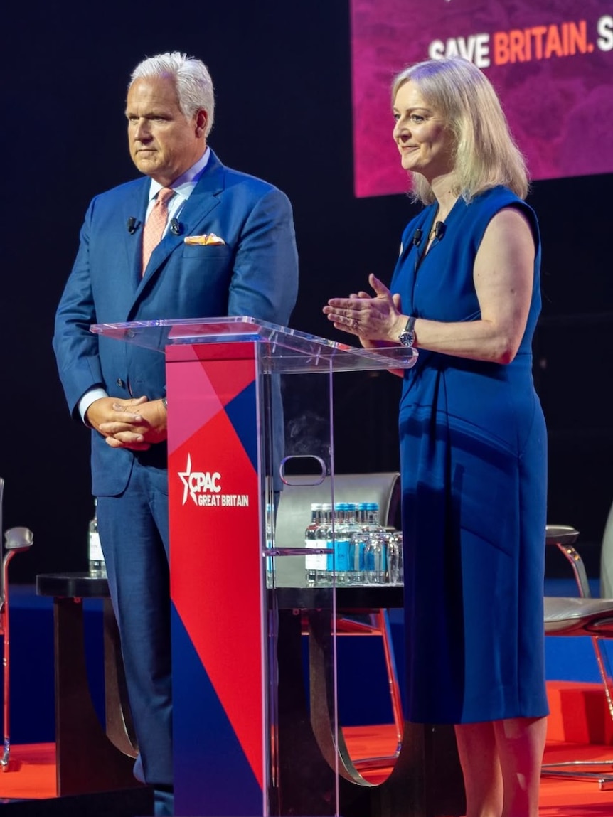 A man and a woman on stage.