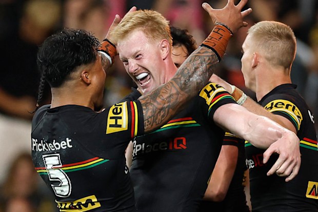 Thomas Jenkins of the Panthers celebrates a try.