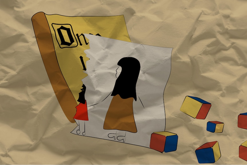 A children's book with a torn page and blocks nearby