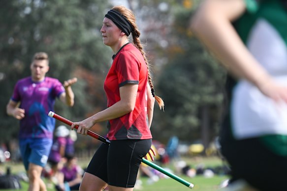 Rebecca Robb competes in a match during the Quadball NSW competition.