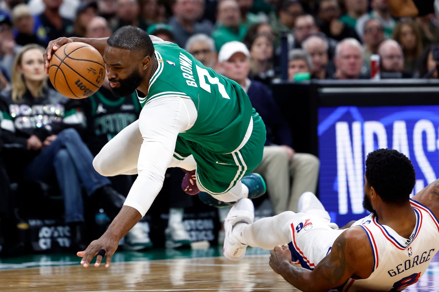 The trade of Jaylen Brown to the 76ers for Paul George (right) potentially trips up the Celtics for the next two seasons.