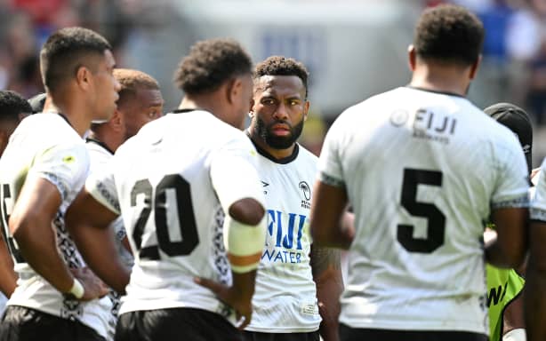 Fiji's flanker Lekima Tagitagivalu (C) and teammates huddle after conceding a sixth try during the Rugby Union Nations Championship match between Fiji and England at Hill Dickinson Stadium in Liverpool on July 11, 2026. (Photo by Oli SCARFF / AFP)