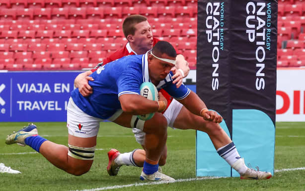 SANTIAGO, CHILE - JULY 4: Lakopo Mapu of Samoa scores a try despite the challenge of Marcus Ramage of Hong Kong China during a match between Samoa and Hong Kong China on July 4, 2026 in Santiago, Chile. (Photo by Marcelo Hernandez - World Rugby/World Rugby via Getty Images)